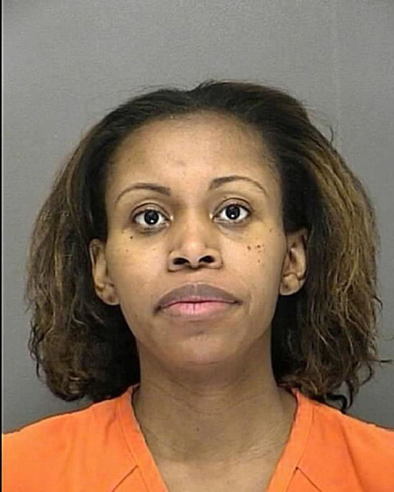 Ebony Wilkerson appears in a booking mugshot released by the Volusia County Sheriff's department in Daytona Beach March 7, 2014. Wilkerson, a mother who drove a minivan carrying her three young children into the surf off a Florida beach, has been charged with three counts of attempted murder, law enforcement officials announced on Friday.