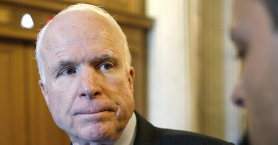 Image: McCain takes questions from reporters after the weekly Republican caucus luncheon at the U.S. Capitol in Washington
