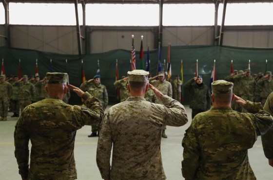 New commander Lt. Gen. Joseph Anderson, from left, Gen. Joseph Dunford, the top U.S. commander in Afghanistan, and outgoing commander Lt. Gen. Mark Milley salute during a change of command ceremony at the International Security Assistance Force (ISAF) base in Kabul, Afghanistan on Feb. 8, 2014. The incoming No. 2 American commander in Afghanistan, Lt. Gen. Anderson, said his immediate focus is on supporting Afghan elections - not on the possibility of U.S. troops remaining after the NATO-led combat mission ends.