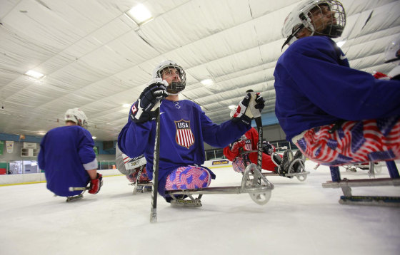 Image: The 2014 U.S. Paralympic sled hockey team practices in Colorado