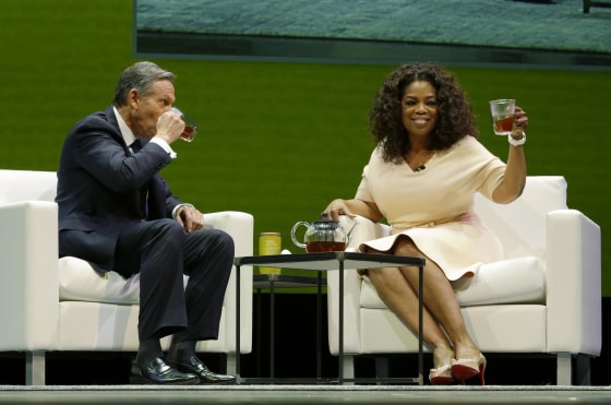 Image: Howard Schultz and Oprah Winfrey announce \"Oprah Chai\" in Seattle.