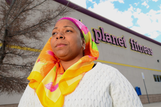 Image: Tarainia McDaniel is photographed in front of Planet Fitness in Albuquerque, N.M.