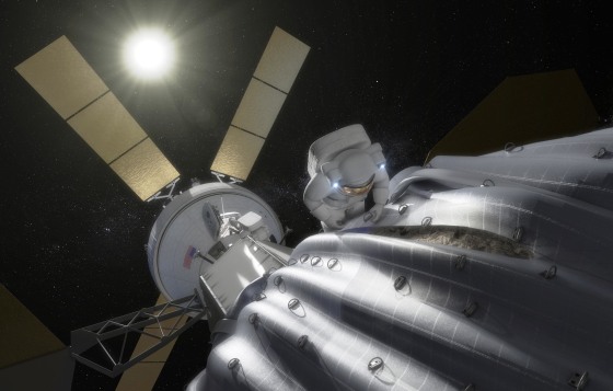 An artist's conception shows an astronaut preparing to take samples from a captured and bagged asteroid after it has been relocated to a stable orbit beyond the moon. An Orion crew spacecraft hangs in the background.