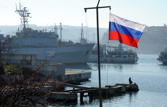Image: The Russian flag waves in front of the Ukrainian military ship the Slavutich moored in the bay of Sevastopol