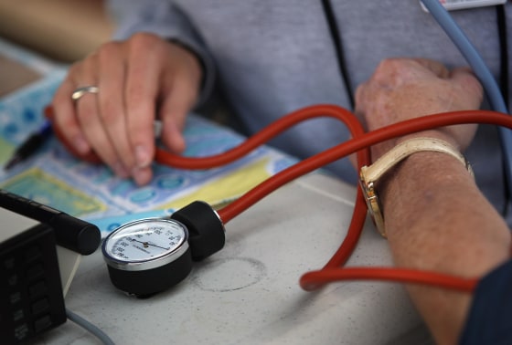 A nurse checks a patient's blood pressure at the Remote Area Medical (RAM), healthcare clinic in Wise, Va., in 2008. The free weekend clinic, staffed by more than 1,400 volunteer dentists, doctors and medical personnel, is the largest of its kind in the nation and organizers expect more than 2,500 patients to turn out for the 2 1/2 day event. Residents of the area, most from the "coal counties" of Appalachia, come from one of the poorest and least educated areas in the United States. Most are underinsured or have no healthcare at all, and for many the annual RAM event is the only medical treatment they may get all year.