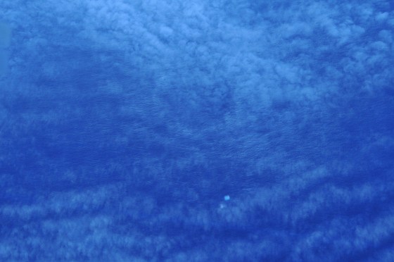 Suspicious objects are seen from a Chinese IL-76 search plane over the southern Indian Ocean, March 24, 2014.