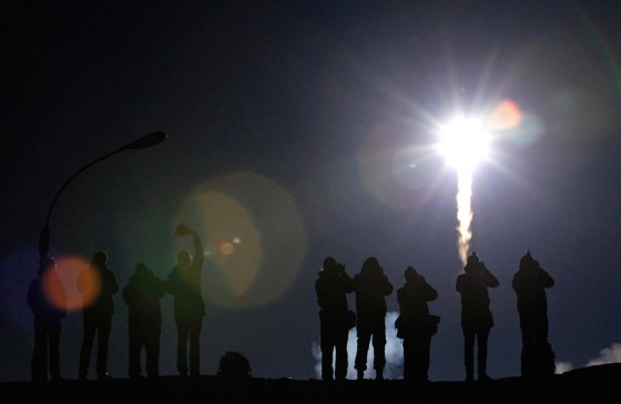 Image: The Soyuz TMA-12M spacecraft carrying the ISS crew of U.S. astronaut Swanson, Russian cosmonauts Skvortsov and Artemyev blasts off from its launch pad at the Baikonur cosmodrome