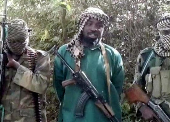 Image: Abubakar Shekau, center, the suspected leader of Nigerian Islamist extremist group Boko Haram