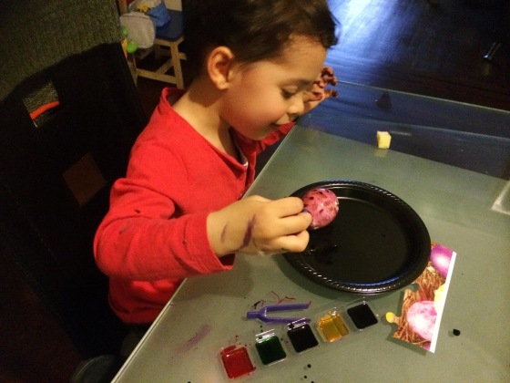 Image: Diana Limongi's son Enzo coloring eggs for the Easter holiday
