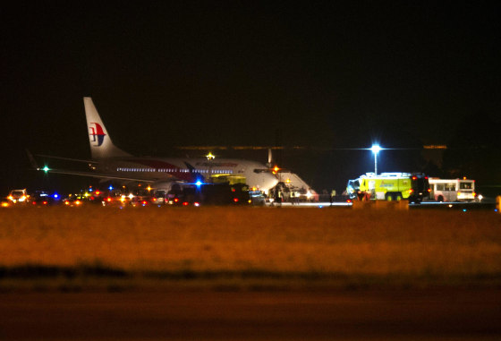Image: Malaysia Airline flight MH192 is seen on the tarmac after an emergency landing at the Sepang International Airport, outside Kuala Lumpur