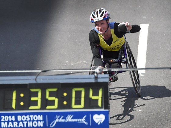 Image: Tatyana McFadden of the U.S., comes down Boylston Street on her way to winning the Women's Push Rim Wheelchair division