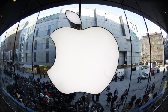 Apple announced a 7-for-1 stock split and quarterly profit and revenue beat Wall Street estimates on Wednesday.