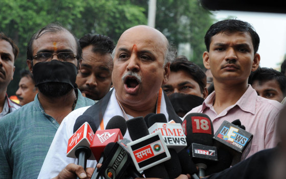 Vishwa Hindu Parishad (VHP) acting president, Pravin Togadia addresses media representatives ahead of a rally in Ahmedabad in September, 2012. Togadia and hundreds of VHP supporters participated in a the rally in support of those convicted in Naroda Patiya case in which some 97 Muslims were burnt alive in the 2002 Gujarat Riots.