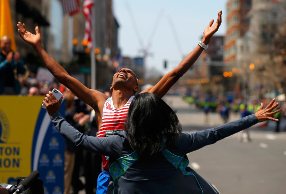 Image: Meb Keflezighi of the U.S. celebrates with his wife Yordanos Asgedom after winning the men's division at the 118th running of the Boston Marathon