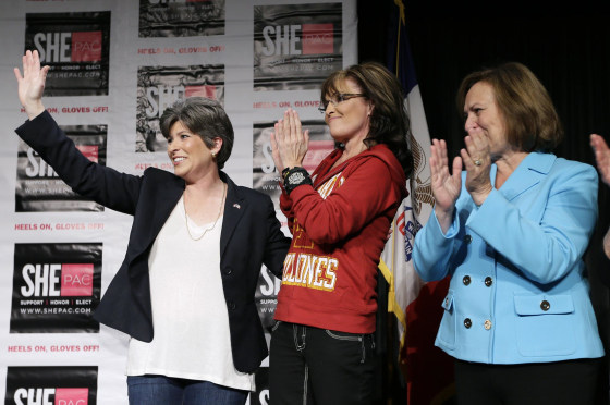 Iowa Republican Senatorial candidate Joni Ernst, left, former Alaska Gov. Sarah Palin, center, and U.S. Sen. Deb Fischer, R-Neb., right, wave to supporters during a campaign rally for Ernst, Sunday, April 27, 2014, in West Des Moines, Iowa.