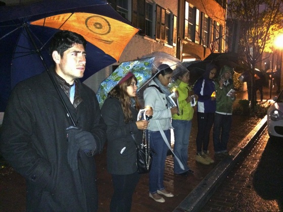 Immigration activists advocating for a stop to deportations gather across from DHS Secretary Johnson's house in Washington, D.C.