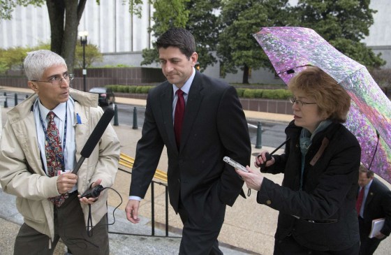 Image: U.S. Representative Ryan talks to reporters as he departs a Republican House caucus meeting on Capitol Hill in Washington