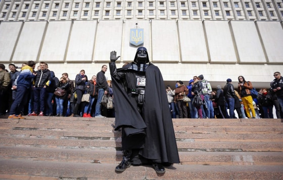 Image: \"Darth Vader\", the leader of the Internet Party of Ukraine, stands during a rally in front of the Ukrainian Central Elections Commission in Kiev
