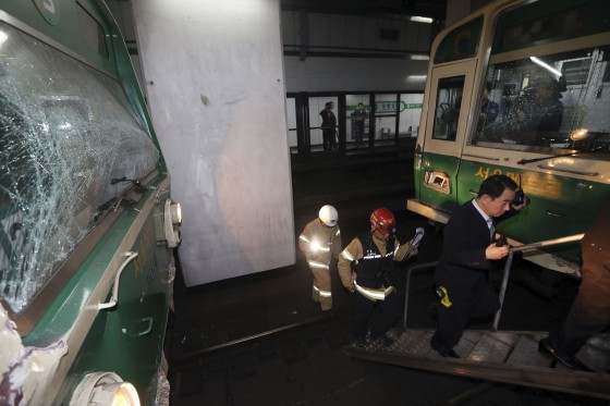Image: Damaged subway trains are seen at a subway station in Seoul