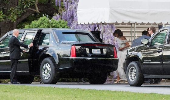 Image: U.S. First Lady Michelle Obama steps into the limousine to depart for the White House Correspondents' Association Dinner from the White House in Washington