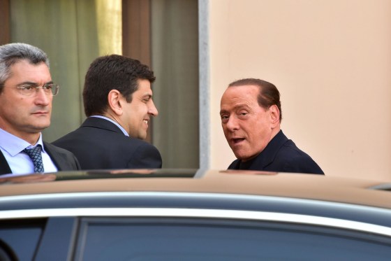 Image: Italian former Prime Minister Silvio Berlusconi arrives at the hospice