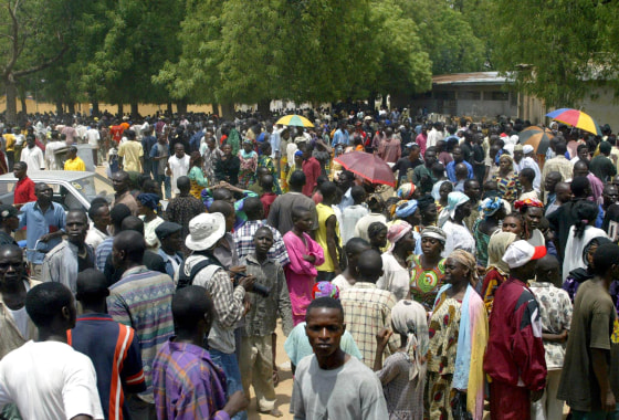 Local Christian people gather as they ar