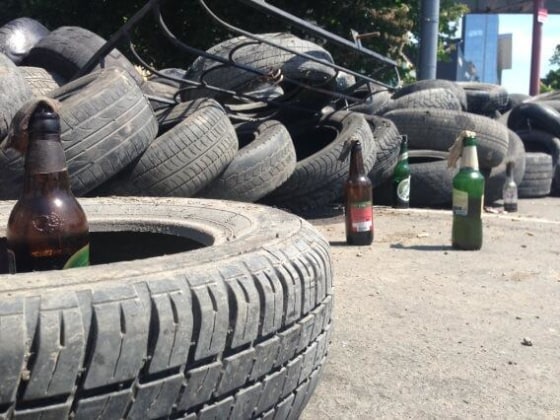 Molotov bottles at the ready behind the barricades in Mariupol.