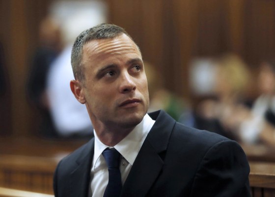Image: Oscar Pistorius sits in the dock on Tuesday.