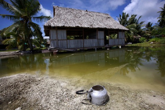 Image: Abandoned house in Kiribati affected by seawater during high tides