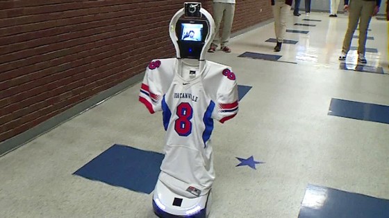 Image: An injured student attends school with the help of a robot.