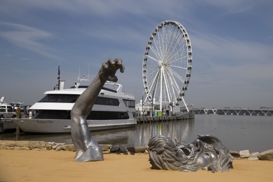 Image: The Awakening sculpture and Capital Wheel