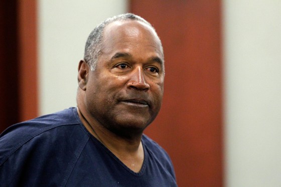 Image: O. J. Simpson stands during a break during the second day of evidentiary hearing in Clark County District Court