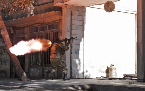 Image: An Afghanistan National Army (ANA) soldier fires his weapon