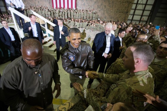 Image: President Barack Obama shakes hands at a troop rally at Bagram Air Field