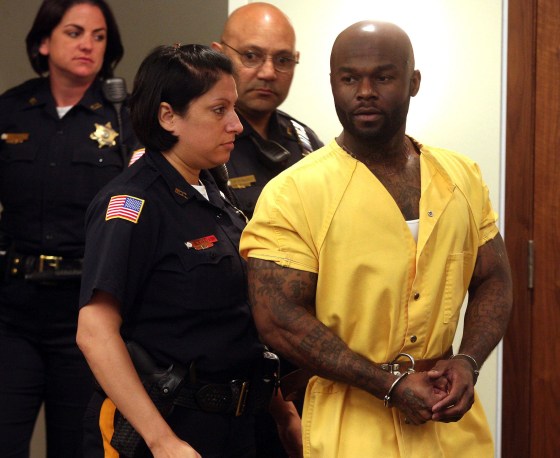 Image: Arthur Morgan III is led into Monmouth County Superior Court by Sheriffs officers for his sentencing hearing on May 28