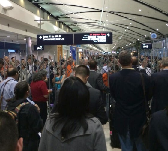 Passengers at Detroit airport faced delays after a passenger entered a secure zone without submitting to a security check.