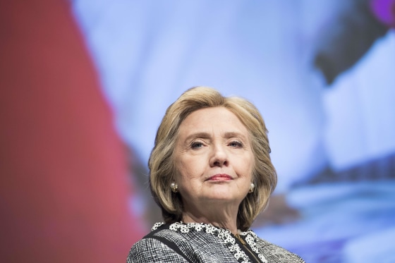 TO GO WITH AFP TEXT BY Pierre-Henry DESHAYES - (FILES) A picture taken on May 14, 2014 shows former Secretary of State Hillary Clinton waiting to speak at the World Bank in Washington, DC. AFP PHOTO / BRENDAN SMIALOWSKIBRENDAN SMIALOWSKI/AFP/Getty Images