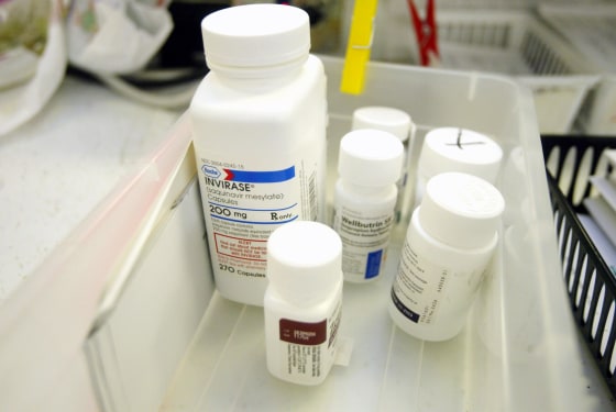 Image: Prescription drugs are prepared for a customer at a pharmacy