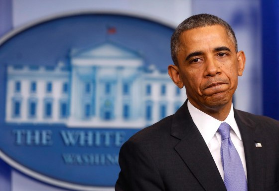 Image: U.S. President Obama pauses while talking about the Affordable Care Act at the White House in Washington