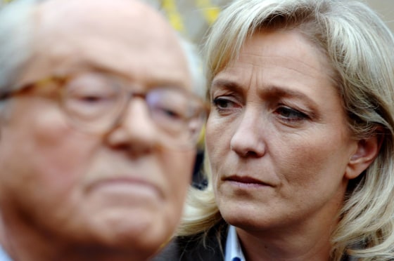 Image: Marine Le Pen listens to her father Jean-Marie Le Pen