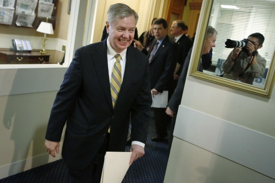 Image: U.S. Senator Lindsey Graham arrives for a news conference about proposed gun violence legislation in Washington