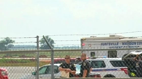 Image: First responders on the scene of a plane crash in Hunstville, Ala.