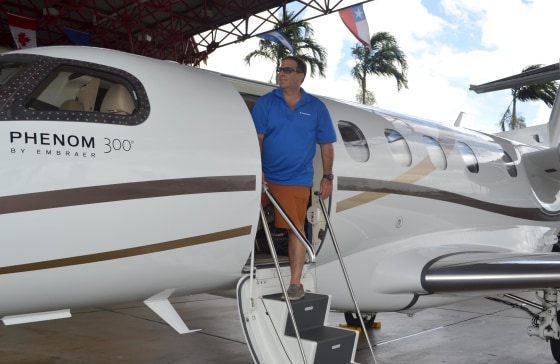 David Mendal, who owns several luxury travel companies, is shown next to his jet at the revamped Opa-locka Executive Airport. An airport with a storied history, it had fallen into disrepair until the increasing numbers of wealthy Latin Americans and other entrepreneurs and jetsetters helped boost demand for the airport.