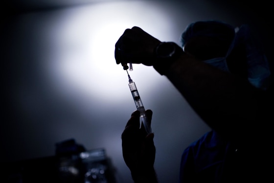Image: A doctor draws medicine into a syringe at Johns Hopkins Hospital on June 26, 2012 in Baltimore, Md.