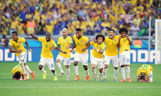 Image: Brazil celebrates after winning the penalty shoot-out during the 2014 FIFA World Cup Brazil Round of 16 match between Brazil and Chile
