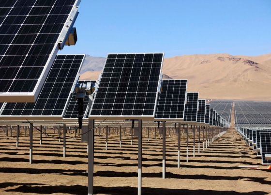 Image: Solar panels of local mining company CAP are seen in the Atacama Desert