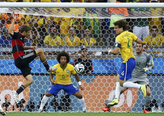 Image: Germany's Mueller scores the team's first goal watch during their 2014 World Cup semi-finals against Brazil at the Mineirao stadium in Belo Horizonte