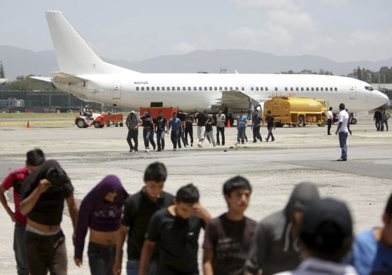 126 Guatemalan migrants who were deported from the U.S. arrive at La Aurora airport in Guatemala City, July 10, 2014.