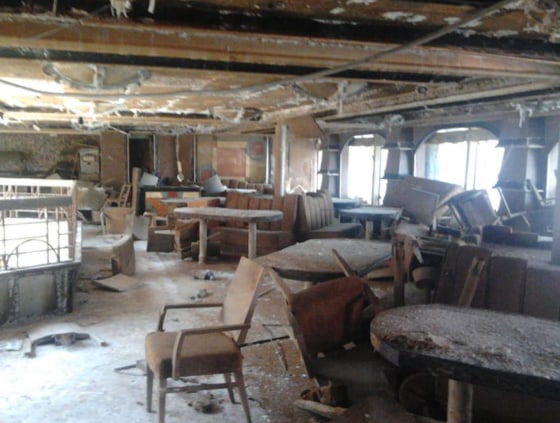 Image: The Costa Concordia, which ran aground over two and a half years ago, is floating again on July 13, 2014 and will be moved to the Italian port of Genoa to be dismantled.