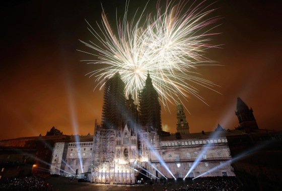 Image: Fireworks explode over an ancient cathedral during celebrations for St. James' day in Santiago de Compostela, northwestern Spain